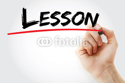 Hand_writing_Lesson_with_marker_business_concept.jpg